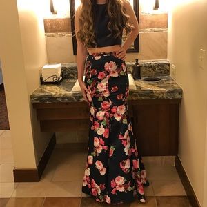 Two piece dress with a navy top and floral bottom